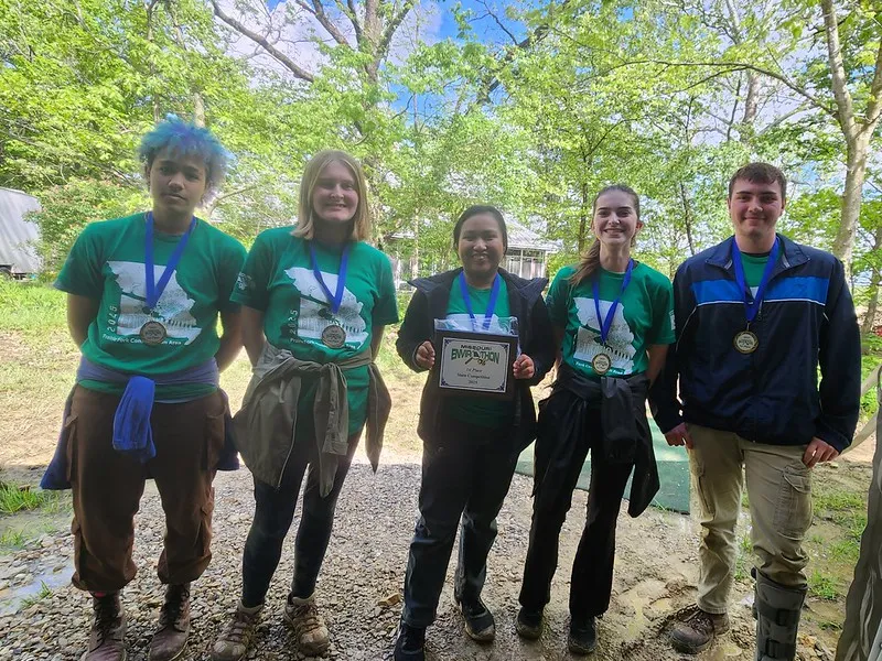 Picture of 5 team members standing in a row outdoors, 2025 State Winner – Parkway North High School