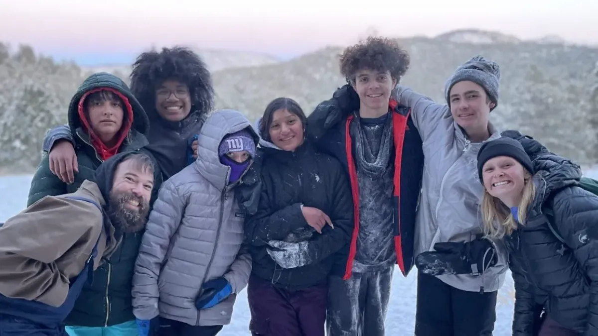 Students pose in the snow with their Instructors on their Cottonwood Institute program
