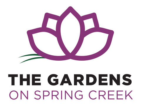 Flower with 5 purple petals and 2 green leaves above text that reads "The Gardens on Spring Creek"